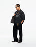 Willy Chavarria Community Center Buffalo Tee in Pirate Black – alternate model view