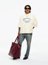 Willy Chavarria Community Center Buffalo Tee in Masa – model view